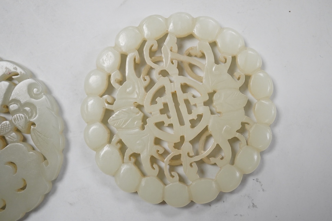 Two Chinese celadon jade circular plaques, 19th century, 5.5cm diameter